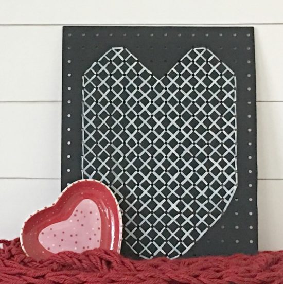 Try this easy Valentines Day Craft perfect for-neutral decor lovers All you need is a piece of pegboard and some paint to faux cross stitch