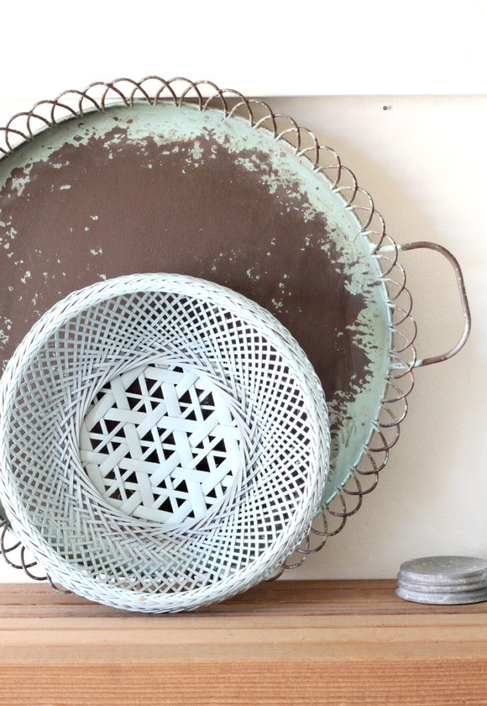 Create this SO EASY upcycled basket wreath with a thrifted basket and a can of spray paint. then add any faux flower or plant for seasonal color.