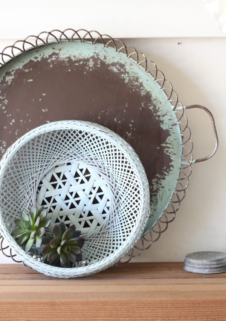 Create this SO EASY upcycled basket wreath with a thrifted basket and a can of spray paint. then add any faux flower or plant for seasonal color.